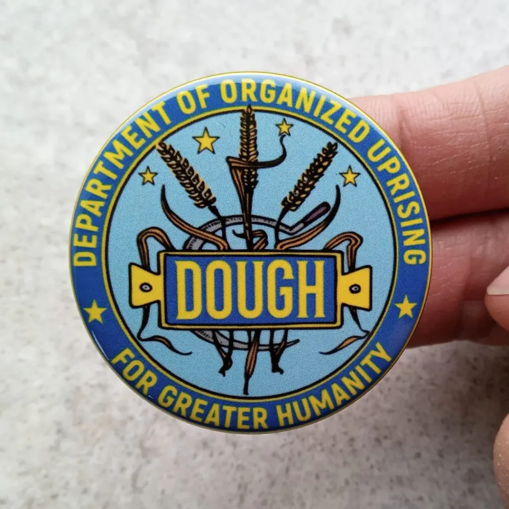 Close up of DOUGH button/pin