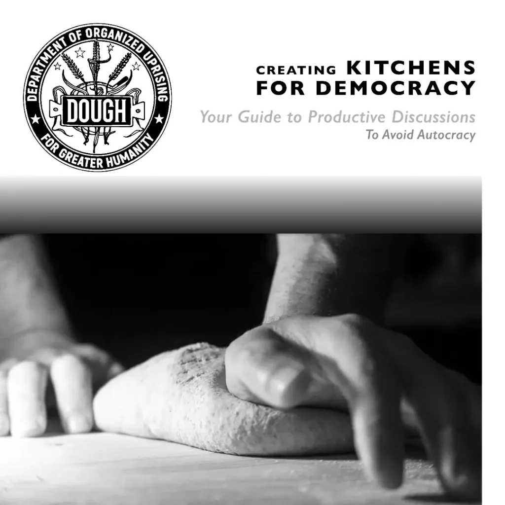 Cover of Kitchens for Democracy guide - hand kneading dough